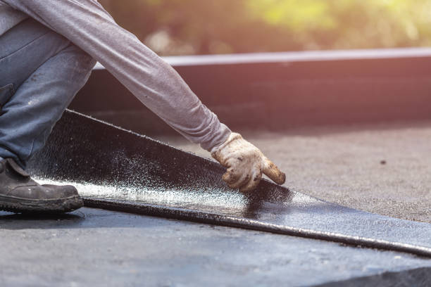 Professional Basement Waterproofing technician working in Pemberton, OH